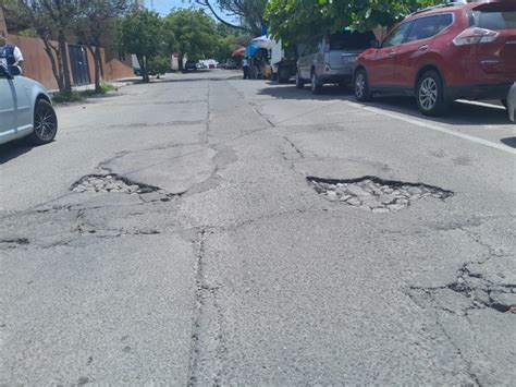 Baches Sobre Calle Libertad En La Colonia Magisterial Generan Riesgos