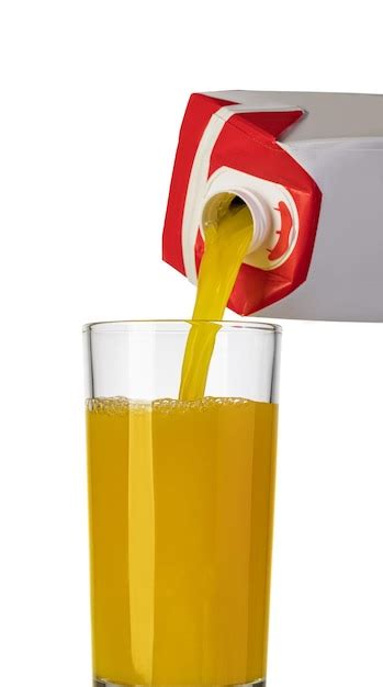 Premium Photo Pouring Orange Juice From Bottle Into Glass