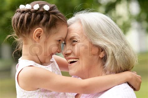 Granny And Granddaughter Posing Outdoors Stock Image Colourbox