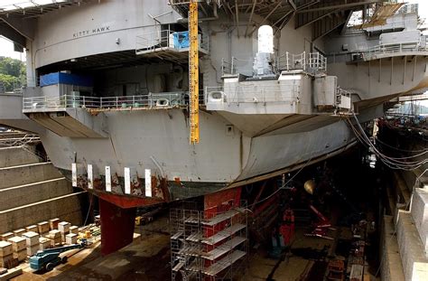 Uss Kitty Hawk Cv 63 Sits In Dry Dock Undergoing Repairs At Naval