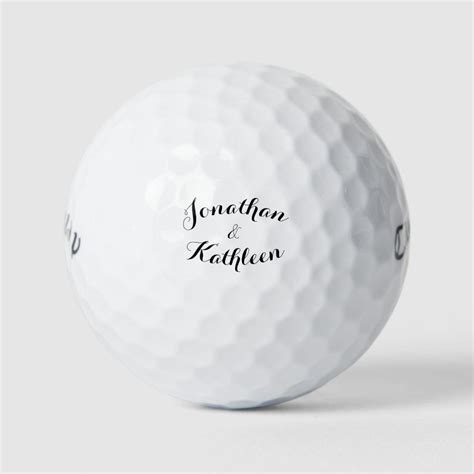 A White Golf Ball With The Name Jonathan And Kahlhan On Its Side