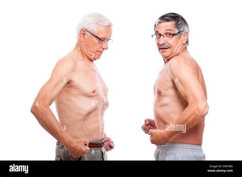 Two Naked Seniors Comparing Figure Isolated On White Background Stock Photo Alamy