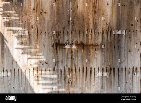 Weathered Wooden Door With Rusty Metal Bolt On Sunny Day In Sa Caleta