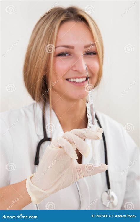 Nurse Making Injection To Patient Stock Images Image