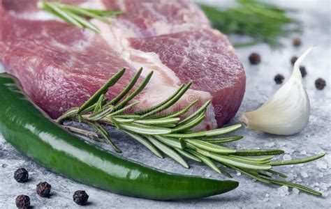 Raw Pork Steak On Dark Background With Herbs Stock Image Image Of