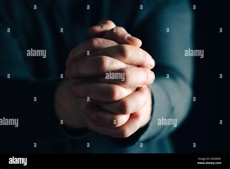 Man Hands In Praying Position Low Key Image Stock Photo Alamy