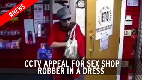 Crossdressing Gunman Who Raided Sex Shop In Red Dress Caught On Cctv Pulling Revolver From