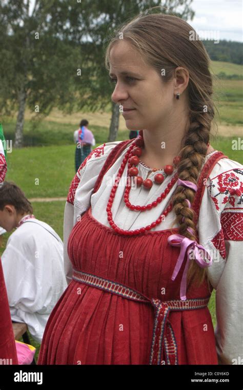 Woman In A Russian Folk Dress At Folklore Festival In Pskov Region