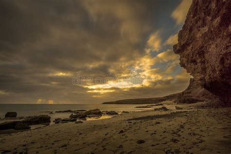 Beach on a Canarian Island with Dark Clouds Stock Photo - Image of fish, canarian: 109450456