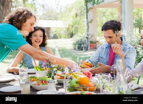 friends  meal  outdoors stock photo alamy