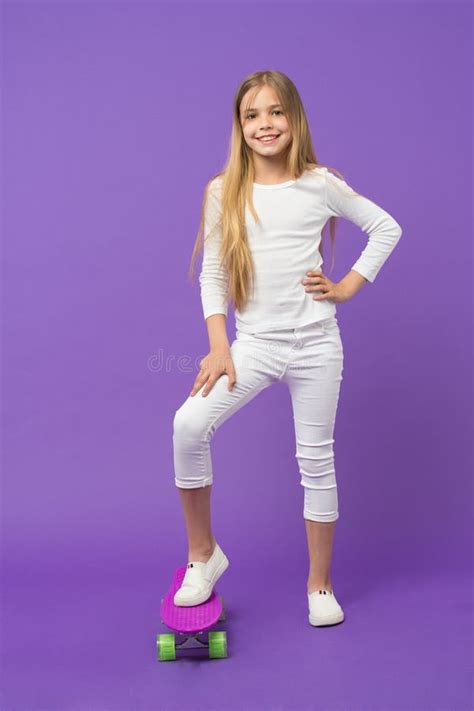 Skateboard Kid in Casual Wear on Violet Background. Girl Skater Smiling with Longboard Stock ...