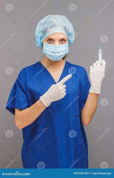 Woman Doctor In The Uniform With A Syringe Stock Image Image Of