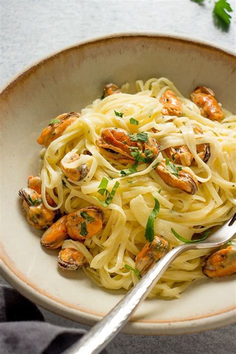 Mussels Pasta In A Creamy Garlic Sauce Is A Quick Flavorful And