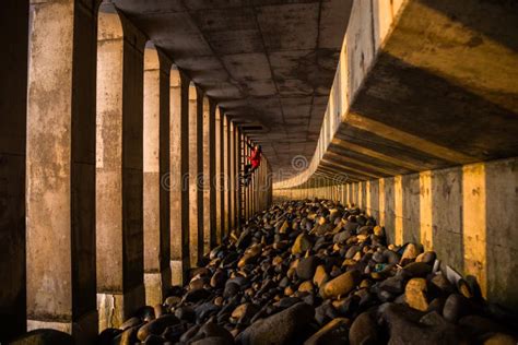 Large Underground Bridge Structure on Beach in Japan. a Man Climbs a ...