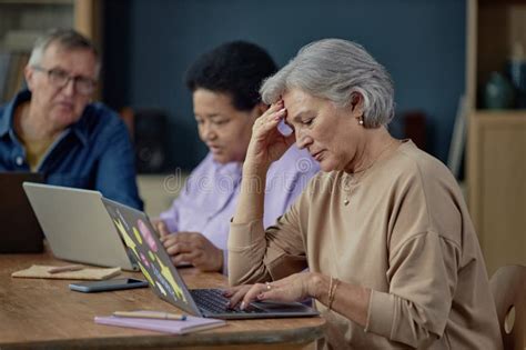 Troubled Mature Woman Learning To Use Laptop Stock Photo Image Of Workshop Adult