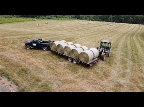 Hauling Round Bales Back To The Farm Youtube