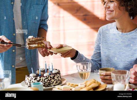 Sharing Birthday Cake Stock Photo Alamy