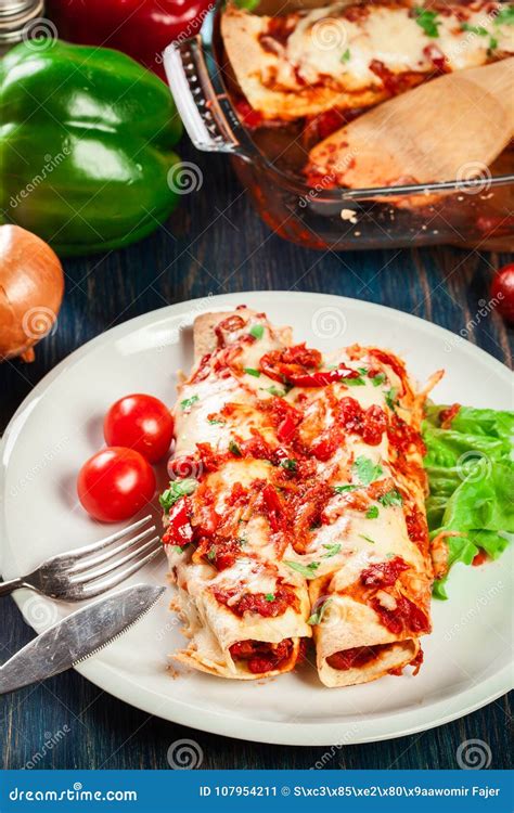 Traditional Mexican Enchiladas With Chicken Meat Spicy Tomato Sauce