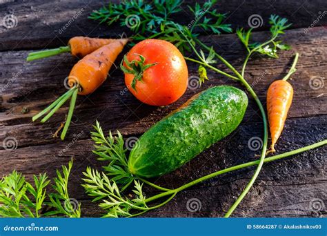 Cucumber tomato carrot stock image. Image of peas, organic - 58664287