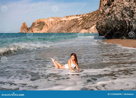 Happy Woman In Bikini Lying On The Sea Beach Tanned Girl Sunbathing On