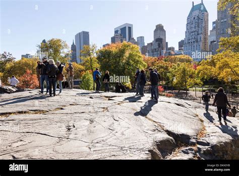 Rock Formation And Skyline In Autumn Central Park Nyc Stock Photo