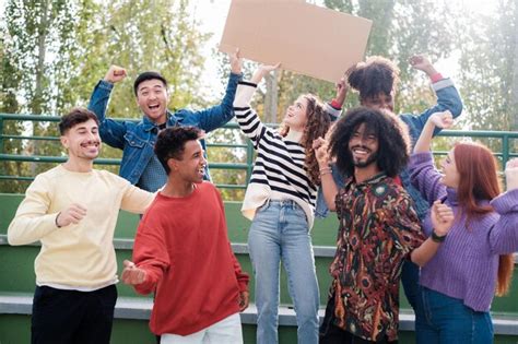 Premium Photo Group Of Young People Cheering From The Stands And