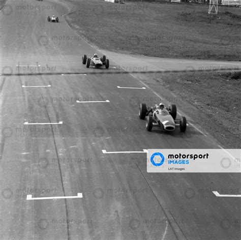 Richie Ginther BRM P261 Leads Mike Hailwood Lotus 25 BRM United