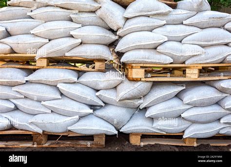 Wall of sandbags for flood defense or military use close up Stock Photo ...