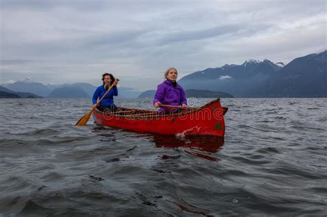 Adventurous Girls Canoeing In Howe Sound Stock Image Image Of