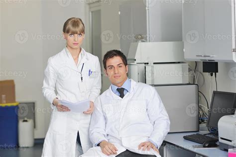 science people in bright lab 10389544 Stock Photo at Vecteezy