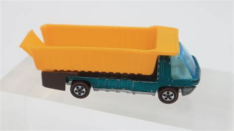 Hot Wheels Heavyweights Vehicles Green Cement Mixer Aqua Dump Truck Red Ambulance And Or