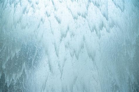 Agua Que Cae Sobre La Pared De Vidrio Fondo Borroso Foto Premium