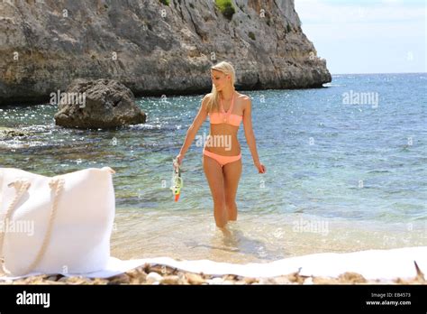 Fit Smiling Woman In Bikini Holding Snorkeling Stock Photo Alamy