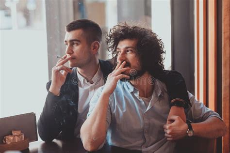 Portrait Of Multiethnic Diverse Gay LGBT Romantic Male Couple Embracing