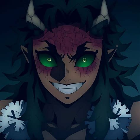 An Anime Character With Green Eyes And Demon Horns On His Head Staring