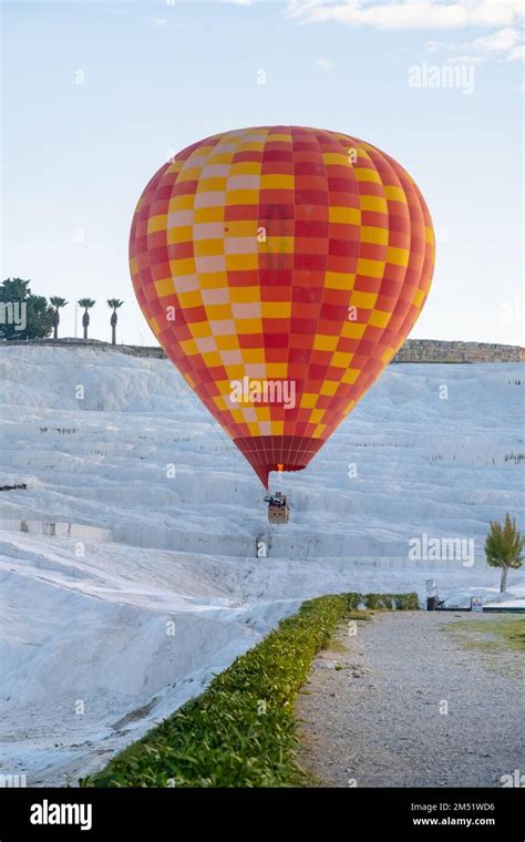 Hot Air Balloon Flying Over Travertine Pools Limestone Terraces On A