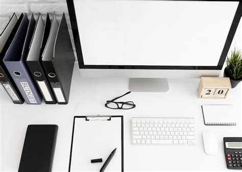 Free Photo High Angle Of Office Desk With Computer Screen And Clipboard