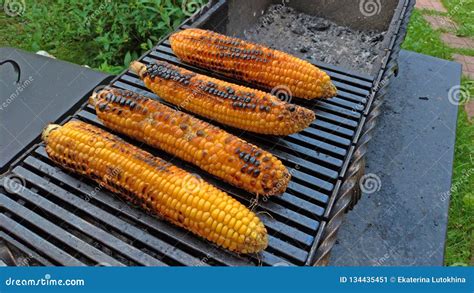 Grilled Corn Grilled On Fire On A Dark Iron Table Grilled Corn