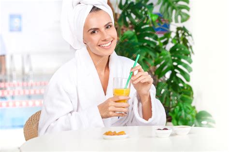 Premium Photo Relaxing At Spa Attractive Young Woman In Bathrobe