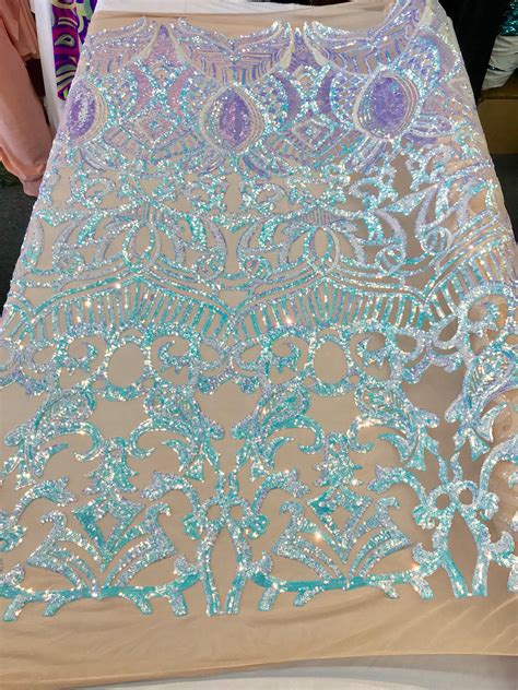 Aqua Royalty Iridescent Sequins On A 4 Way Stretch Nude Mesh Lace