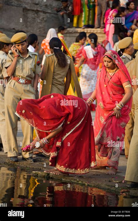 Rajasthani Women Gather At The Gangaur Ghat On The Shore Of Pichola Lake For The Gangaur