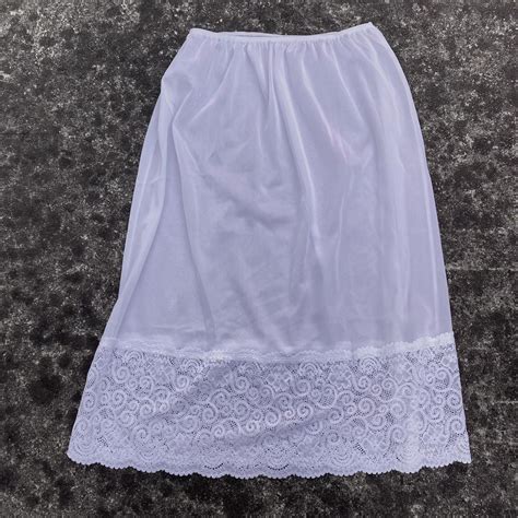 Sheer white skirt with gorgeous lace trim Marked... - Depop