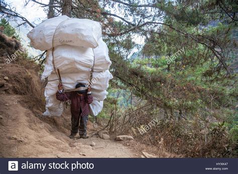 Man Carrying Load Stock Photos Man Carrying Load Stock Images Alamy