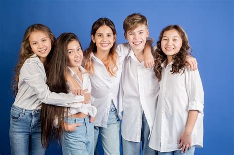 Premium Photo | Group of young happy school friends