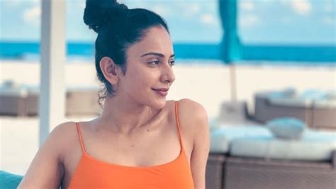 Rakul Preet Singh Says Thank God For A Holiday As She Chills In Orange Swimsuit By The Beach