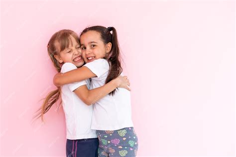 Two Little Girls Hugging