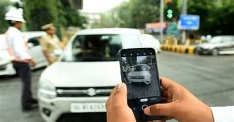 Noida Woman Fined ₹ 1 000 For Not Wearing Helmet In A Car The Reason Will Shock You