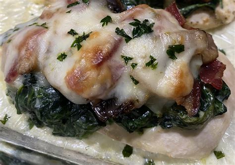 Smothered Chicken With Creamed Spinach Sautéed Mushrooms And Bacon