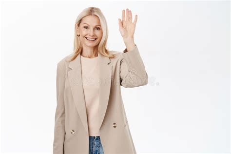 Smiling Mature Blond Woman Saying Hello Introduce Herself Hi Gesture With Friendly Happy Face