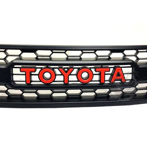 TOYOTA HILUX REVO FRONT GRILLE WITH TOYOTA WORDING RED Hobbies